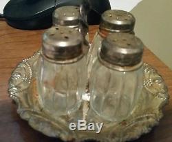 Antique 4 glass salt and pepper shakers with carrier