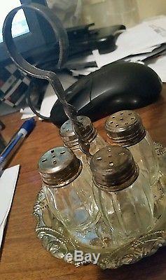 Antique 4 glass salt and pepper shakers with carrier