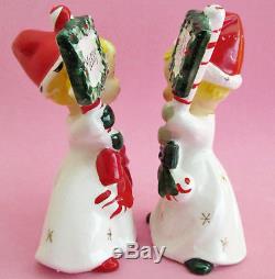 GIRL & BOY CARRYING MERRY CHRISTMAS SIGNS Salt and Pepper Shakers NAPCO