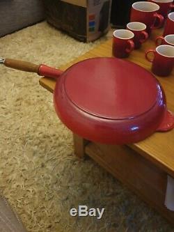 Le creuset cast iron set with salt pepper and other items. Most items unused