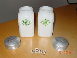 Milk glass salt and pepper shakers original lids