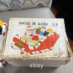 RARE VTG Lipper & Mann SALT & PEPPER Candle Kissing Santa & Mrs Claus In Sleigh