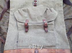 Swiss Army Salt and Pepper vintage rucksack- roll top fastening