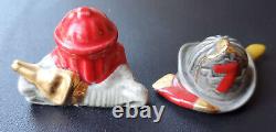 Vintage Arcadia Miniature Salt & Pepper Shakers Fire Hose & Firefighter Gear