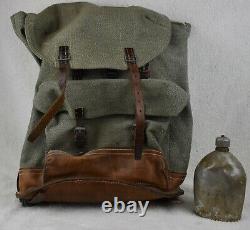 Vintage Swiss Army green salt and pepper leather backpack canvas with canteen