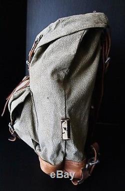 Vintage Swiss Military Leather and Salt & Pepper Canvas Backpack