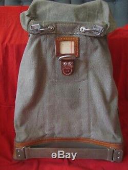 Vintage Swiss military salt and pepper canvas backpack with leather straps