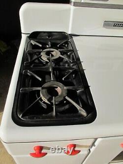 Vintage Tappan gas stove with Salt & Pepper Shakers 1950's White with Red Trim- NICE